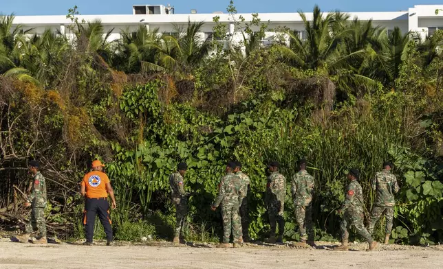 Military personnel and civil defense members search for Sudiksha Konanki, a university student from the U.S. who disappeared on a beach in Punta Cana, Dominican Republic, Monday, March. 10, 2025. (AP Photo/Francesco Spotorno)