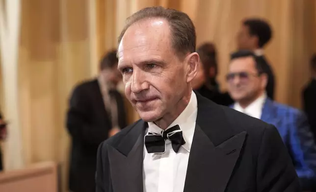 Ralph Fiennes arrives at the Oscars on Sunday, March 2, 2025, at the Dolby Theatre in Los Angeles. (AP Photo/John Locher)