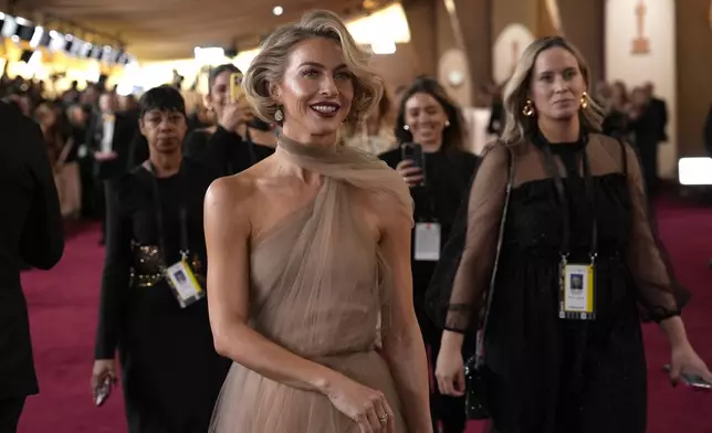 Julianne Hough arrives at the Oscars on Sunday, March 2, 2025, at the Dolby Theatre in Los Angeles. (AP Photo/John Locher)