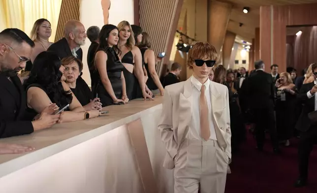 Calum Harper arrives at the Oscars on Sunday, March 2, 2025, at the Dolby Theatre in Los Angeles. (AP Photo/John Locher)
