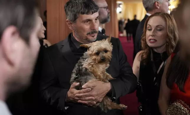 Slava Leontyev arrives at the Oscars on Sunday, March 2, 2025, at the Dolby Theatre in Los Angeles. (AP Photo/John Locher)