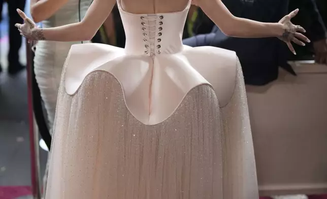 Ariana Grande arrives at the Oscars on Sunday, March 2, 2025, at the Dolby Theatre in Los Angeles. (AP Photo/John Locher)