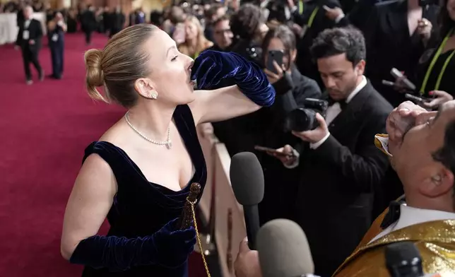 Scarlett Johansson arrives at the Oscars on Sunday, March 2, 2025, at the Dolby Theatre in Los Angeles. (AP Photo/John Locher)