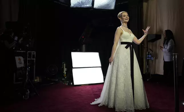 Elle Fanning arrives at the Oscars on Sunday, March 2, 2025, at the Dolby Theatre in Los Angeles. (AP Photo/John Locher)
