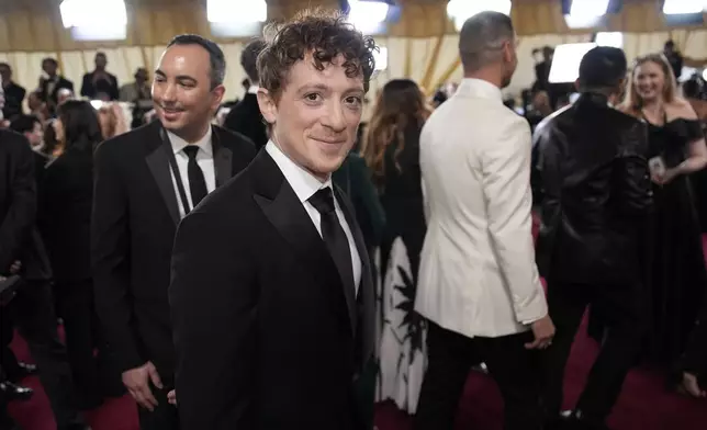 Ethan Slater arrives at the Oscars on Sunday, March 2, 2025, at the Dolby Theatre in Los Angeles. (AP Photo/John Locher)