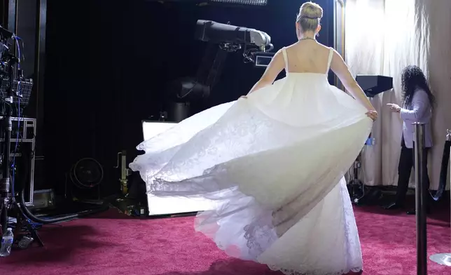 Elle Fanning arrives at the Oscars on Sunday, March 2, 2025, at the Dolby Theatre in Los Angeles. (AP Photo/John Locher)