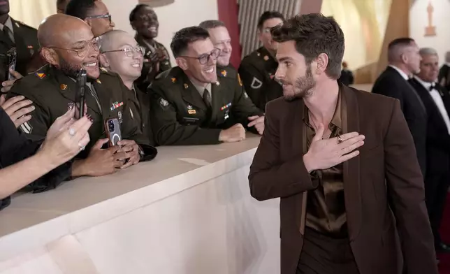 Andrew Garfield arrives at the Oscars on Sunday, March 2, 2025, at the Dolby Theatre in Los Angeles. (AP Photo/John Locher)