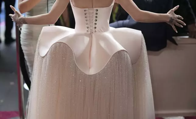 Ariana Grande arrives at the Oscars on Sunday, March 2, 2025, at the Dolby Theatre in Los Angeles. (AP Photo/John Locher)