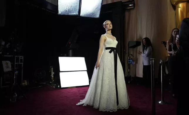Elle Fanning arrives at the Oscars on Sunday, March 2, 2025, at the Dolby Theatre in Los Angeles. (AP Photo/John Locher)