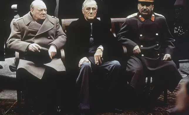 FILE - From left, British Prime Minister Winston Churchill, U.S. President Franklin Roosevelt and Soviet leader Josef Stalin sit on the patio of the Livadia Palace, in Yalta, Crimea, on Feb. 4, 1945. (AP Photo, File)