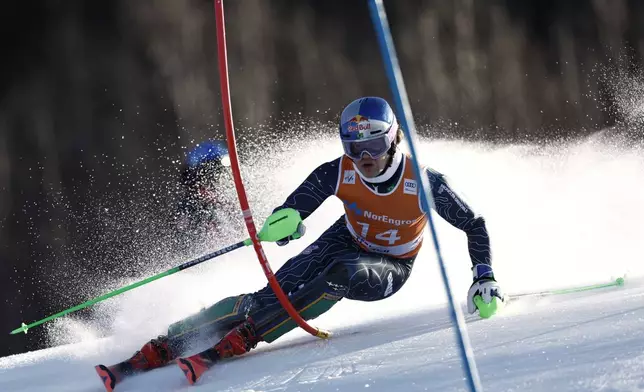 Brazil's Lucas Pinheiro Braathen competes in an alpine ski, men's World Cup slalom, in Hafjell, Norway, Sunday, March 16, 2025. (AP Photo/Gabriele Facciotti)