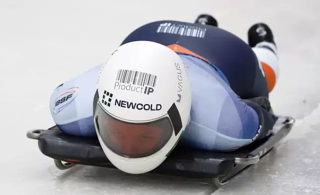 Kimberley Bos, of the Netherlands, slides during her first run at the skeleton world championships, Thursday, March 6, 2025, in Lake Placid, N.Y. (AP Photo/Julia Demaree Nikhinson)