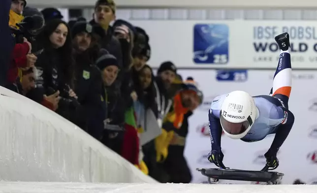 Kimberley Bos, of the Netherlands, slides during her first run at the skeleton world championships, Thursday, March 6, 2025, in Lake Placid, N.Y. (AP Photo/Julia Demaree Nikhinson)