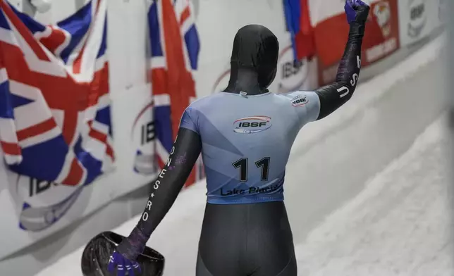 Mystique Ro, of the United States, celebrates during fourth run at the skeleton world championships, Friday, March 7, 2025, in Lake Placid, N.Y. (AP Photo/Julia Demaree Nikhinson)