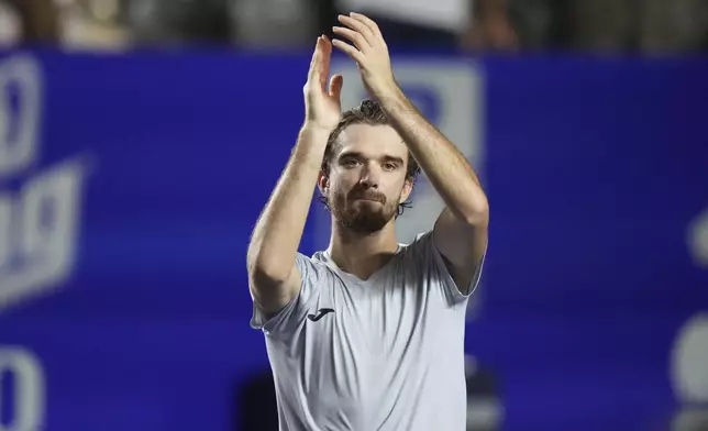 Tomas Machac of Czech Republic celebrates after defeating Alejandro Davidovich Fokina of Spain in the final match at the Mexican Open tennis tournament in Acapulco, Mexico, Saturday, March 1, 2025. (AP Photo/Eduardo Verdugo)