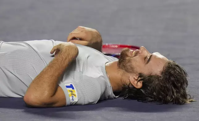 Tomas Machac of Czech Republic celebrates after defeating Alejandro Davidovich Fokina of Spain in the final match at the Mexican Open tennis tournament in Acapulco, Mexico, Saturday, March 1, 2025. (AP Photo/Eduardo Verdugo)