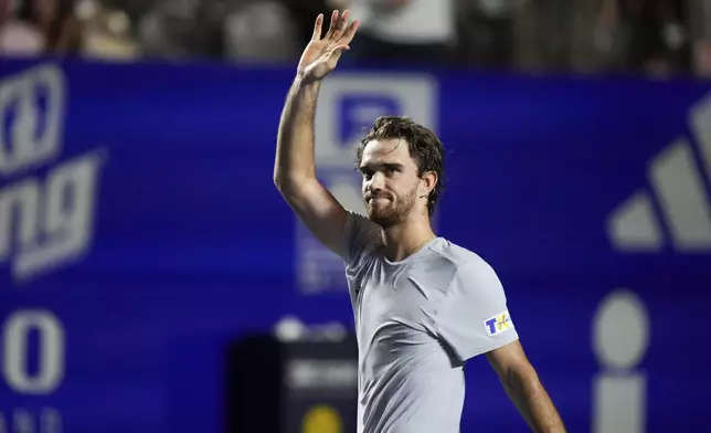 Tomas Machac of Czech Republic celebrates after defeating Alejandro Davidovich Fokina of Spain in the final match at the Mexican Open tennis tournament in Acapulco, Mexico, Saturday, March 1, 2025. (AP Photo/Eduardo Verdugo)