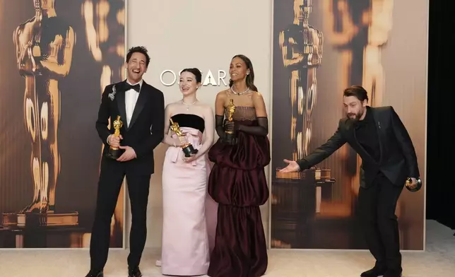 Adrien Brody, from left, winner of the award for best performance by an actor in a leading role for "The Brutalist," Mikey Madison, winner of the award for best performance by an actress in a leading role for "Anora," Zoe Saldana, winner of the award for best performance by an actress in a supporting role for "Emilia Perez," and Kieran Culkin, winner of the award for best performance by an actor in a supporting role for "A Real Pain," pose in the press room at the Oscars on Sunday, March 2, 2025, at the Dolby Theatre in Los Angeles. (Photo by Jordan Strauss/Invision/AP)