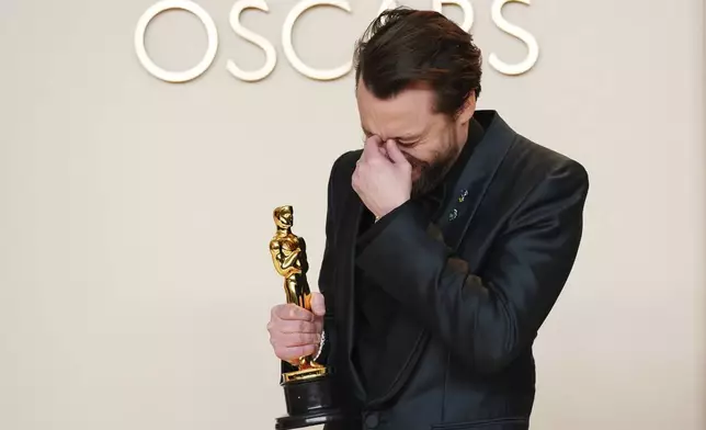 Kieran Culkin, winner of the award for best performance by an actor in a supporting role for "A Real Pain," poses in the press room at the Oscars on Sunday, March 2, 2025, at the Dolby Theatre in Los Angeles. (Photo by Jordan Strauss/Invision/AP)