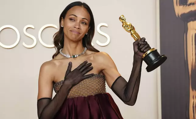Zoe Saldana, winner of the award for best performance by an actress in a supporting role for "Emilia Perez," poses in the press room at the Oscars on Sunday, March 2, 2025, at the Dolby Theatre in Los Angeles. (Photo by Jordan Strauss/Invision/AP)