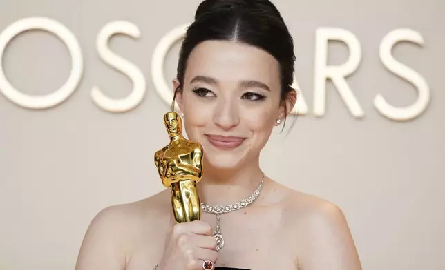 Mikey Madison, winner of the award for best performance by an actress in a leading role for "Anora," poses in the press room at the Oscars on Sunday, March 2, 2025, at the Dolby Theatre in Los Angeles. (Photo by Jordan Strauss/Invision/AP)