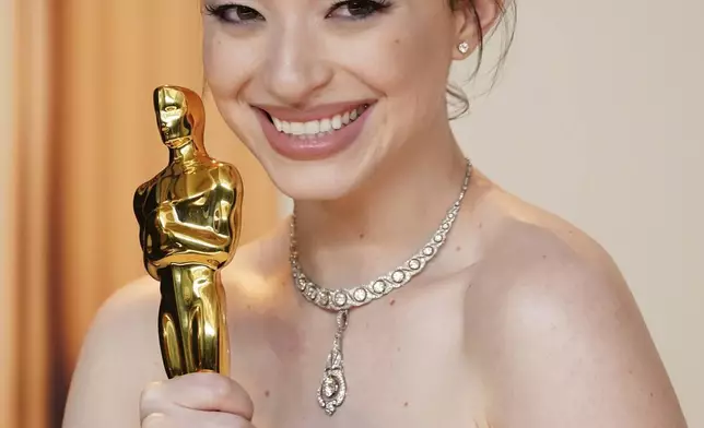 Mikey Madison, winner of the award for best performance by an actress in a leading role for "Anora," poses in the press room at the Oscars on Sunday, March 2, 2025, at the Dolby Theatre in Los Angeles. (Photo by Jordan Strauss/Invision/AP)