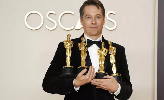 Sean Baker, winner of the awards for best original screenplay, best film editing, best director, and best picture for "Anora," poses in the press room at the Oscars on Sunday, March 2, 2025, at the Dolby Theatre in Los Angeles. (Photo by Jordan Strauss/Invision/AP) poses in the press room at the Oscars on Sunday, March 2, 2025, at the Dolby Theatre in Los Angeles. (Photo by Jordan Strauss/Invision/AP)