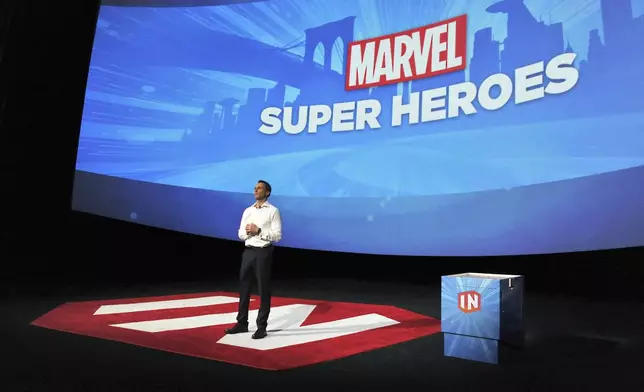 FILE - Disney Interactive President Jimmy Pitaro speaks at Disney Infinity 2.0 launch at Pacific Theatres Cinerama Dome on Wednesday, April 30, 2014 in the Hollywood section of Los Angeles. (Photo by Katy Winn/Invision/AP, File)