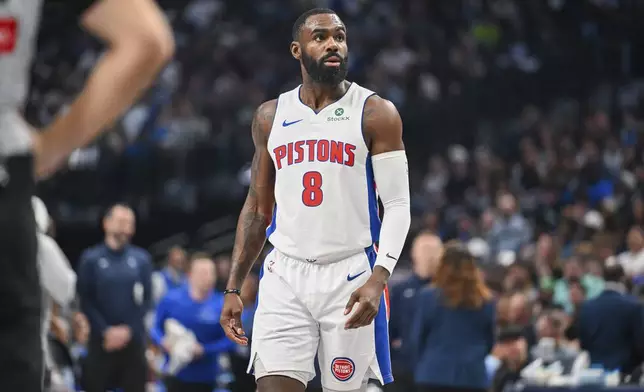 Detroit Pistons forward Tim Hardaway Jr. walks on the court during the first half of an NBA basketball game against the Dallas Mavericks, Friday, March 21, 2025, in Dallas, Texas. (AP Photo/Albert Pena)