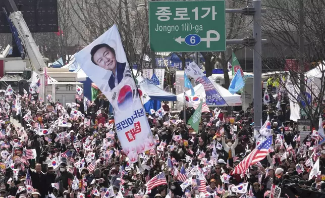Supporters of impeached South Korean President Yoon Suk Yeol stage a rally to oppose his impeachment in Seoul, South Korea, Saturday, March 8, 2025. (AP Photo/Ahn Young-joon)