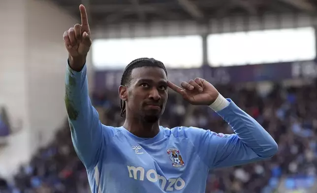 Coventry City's Haji Wright celebrates scoring their side's third goal of the game during a Sky Bet Championship soccer match against Sunderland, Saturday, March 15, 2025, at Coventry Building Society Arena in Coventry, England. (Bradley Collyer/PA via AP)