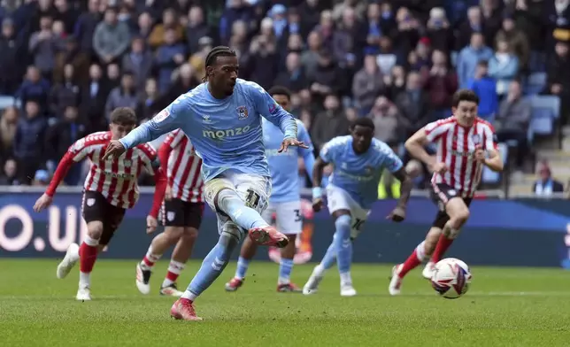 Coventry City's Haji Wright scores their side's second goal of the game from the penalty spot during a Sky Bet Championship soccer match against Sunderland, Saturday, March 15, 2025, at Coventry Building Society Arena in Coventry, England. (Bradley Collyer/PA via AP)