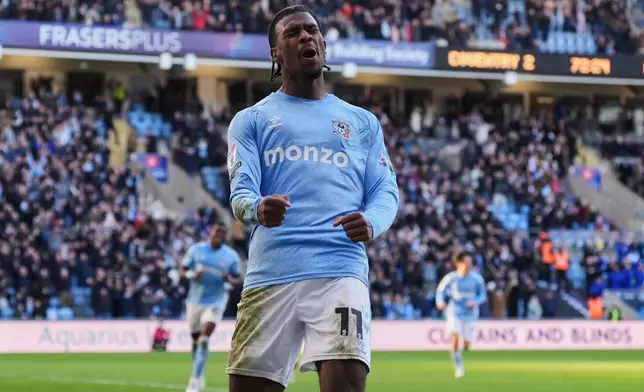 Coventry City's Haji Wright celebrates scoring their side's third goal of the game during a Sky Bet Championship soccer match against Sunderland, Saturday, March 15, 2025, at Coventry Building Society Arena in Coventry, England. (Bradley Collyer/PA via AP)