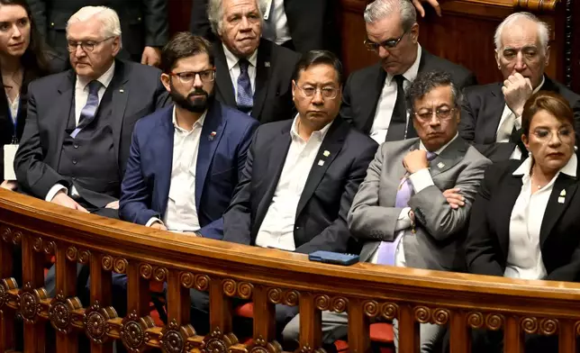 Germany's President Frank-Walter Steinmeier, from left, Chile's President Gabriel Boric, Bolivia's President Luis Arce, Colombia's President Gustavo Petro and Honduran President Xiomara Castro, attend the the swearing-in ceremony for President-elect Yamandu Orsi, at Congress in Montevideo, Uruguay, Saturday, March 1, 2025. Seated left, in back row, is Secretary General of the Organization of American States Luis Almagro. (AP Photo/Santiago Mazzarovich)