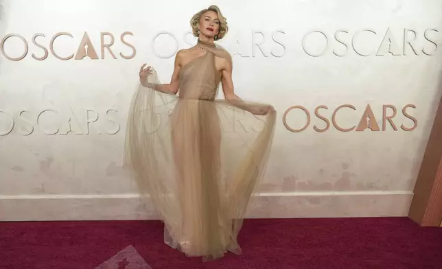 Julianne Hough arrives at the Oscars on Sunday, March 2, 2025, at the Dolby Theatre in Los Angeles. (AP Photo/Jae C. Hong)