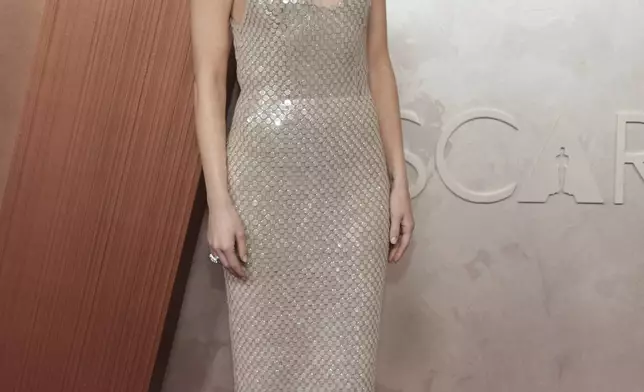 Emma Stone arrives at the Oscars on Sunday, March 2, 2025, at the Dolby Theatre in Los Angeles. (Photo by Jordan Strauss/Invision/AP)