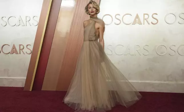 Julianne Hough arrives at the Oscars on Sunday, March 2, 2025, at the Dolby Theatre in Los Angeles. (Photo by Jordan Strauss/Invision/AP)