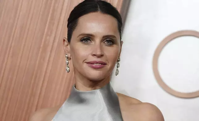 Felicity Jones arrives at the Oscars on Sunday, March 2, 2025, at the Dolby Theatre in Los Angeles. (Photo by Jordan Strauss/Invision/AP)