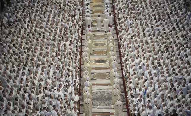 Deacons take part in a mass for their jubilee in St. Peter's Basilica at The Vatican, Sunday, Feb. 23, 2025, that was supposed to be presided over by Pope Francis who was admitted over a week ago at Rome's Agostino Gemelli Polyclinic for pneumonia. (AP Photo/Alessandra Tarantino)
