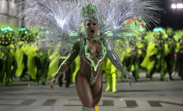 Drum queen Fabiola de Andrade from the Mocidade samba school performs during Carnival celebrations at the Sambadrome in Rio de Janeiro, Tuesday, March 4, 2025. (AP Photo/Bruna Prado)