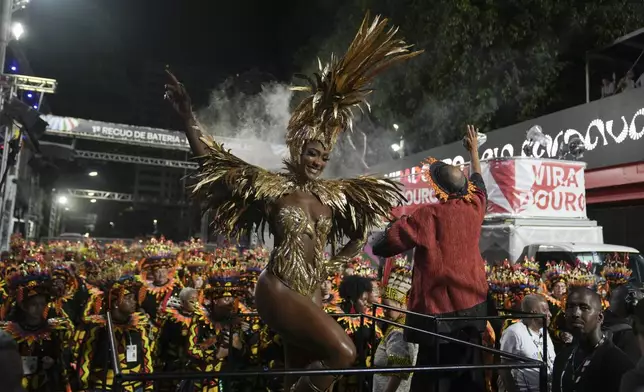 Drum queen Erika Januza, from the Viradouro samba school, performs during Carnival celebrations at the Sambadrome in Rio de Janeiro, Monday, March 3, 2025. (AP Photo/Silvia Izquierdo)