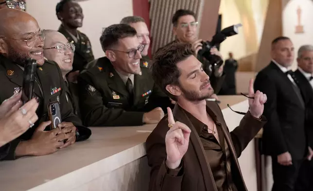 Andrew Garfield arrives at the Oscars on Sunday, March 2, 2025, at the Dolby Theatre in Los Angeles. (AP Photo/John Locher)