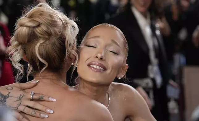 Ariana Grande arrives at the Oscars on Sunday, March 2, 2025, at the Dolby Theatre in Los Angeles. (AP Photo/John Locher)