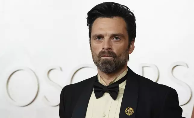 Sebastian Stan arrives at the Oscars on Sunday, March 2, 2025, at the Dolby Theatre in Los Angeles. (Photo by Jordan Strauss/Invision/AP)
