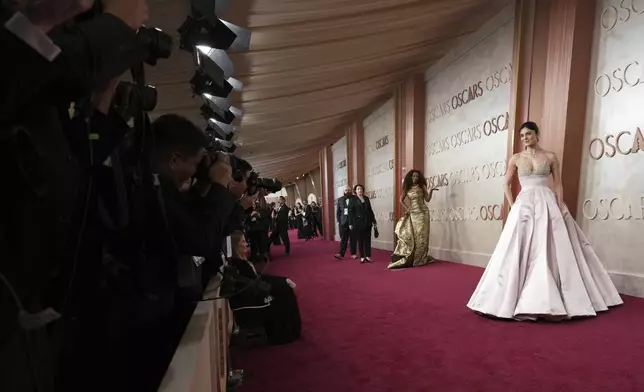 Ryan Michelle Bathe, left, and Monica Barbaro arrive at the Oscars on Sunday, March 2, 2025, at the Dolby Theatre in Los Angeles. (Photo by Jordan Strauss/Invision/AP)