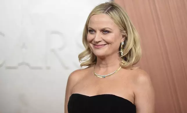 Amy Poehler arrives at the Oscars on Sunday, March 2, 2025, at the Dolby Theatre in Los Angeles. (Photo by Richard Shotwell/Invision/AP)
