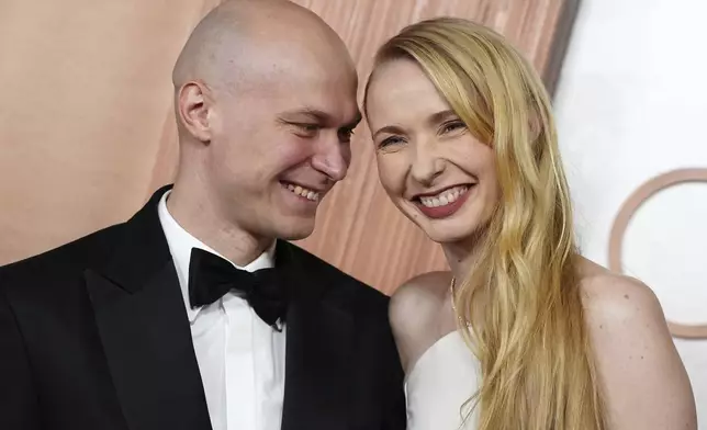 Yura Borisov, left, and Anna Borisova arrive at the Oscars on Sunday, March 2, 2025, at the Dolby Theatre in Los Angeles. (Photo by Jordan Strauss/Invision/AP)