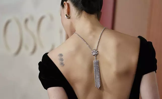 Margaret Qualley arrives at the Oscars on Sunday, March 2, 2025, at the Dolby Theatre in Los Angeles. (Photo by Jordan Strauss/Invision/AP)