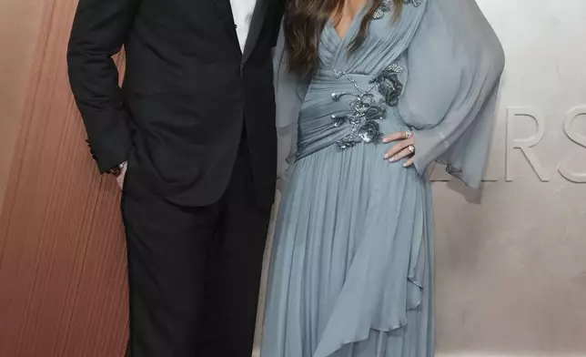 Miles Teller, left, and Keleigh Sperry arrive at the Oscars on Sunday, March 2, 2025, at the Dolby Theatre in Los Angeles. (Photo by Jordan Strauss/Invision/AP)