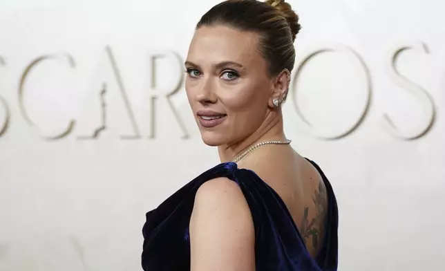 Scarlett Johansson arrives at the Oscars on Sunday, March 2, 2025, at the Dolby Theatre in Los Angeles. (Photo by Jordan Strauss/Invision/AP)